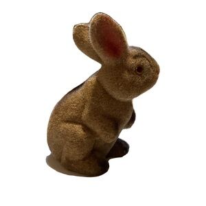 Flocked rabbit coin bank.